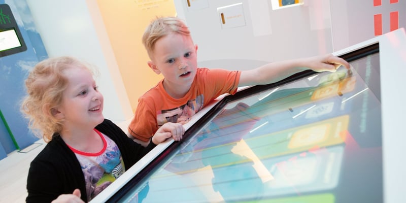 Two children enjoying the exhibition at Ringhals